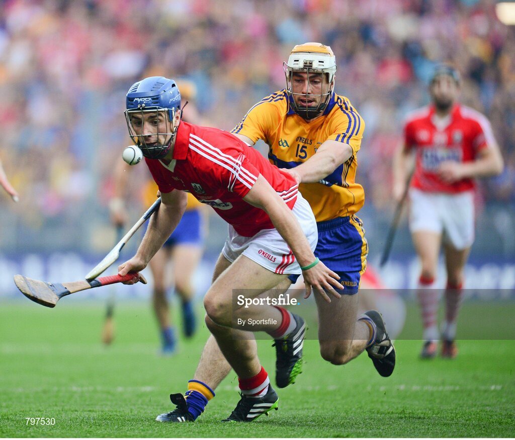 28 September 2013; Conor O'Sullivan, Cork, in action against Conor McGrath, Clare. GAA Hurling All-Ireland Senior Championship Final Replay, Cork v Clare, Croke Park, Dublin. Photo by Sportsfile