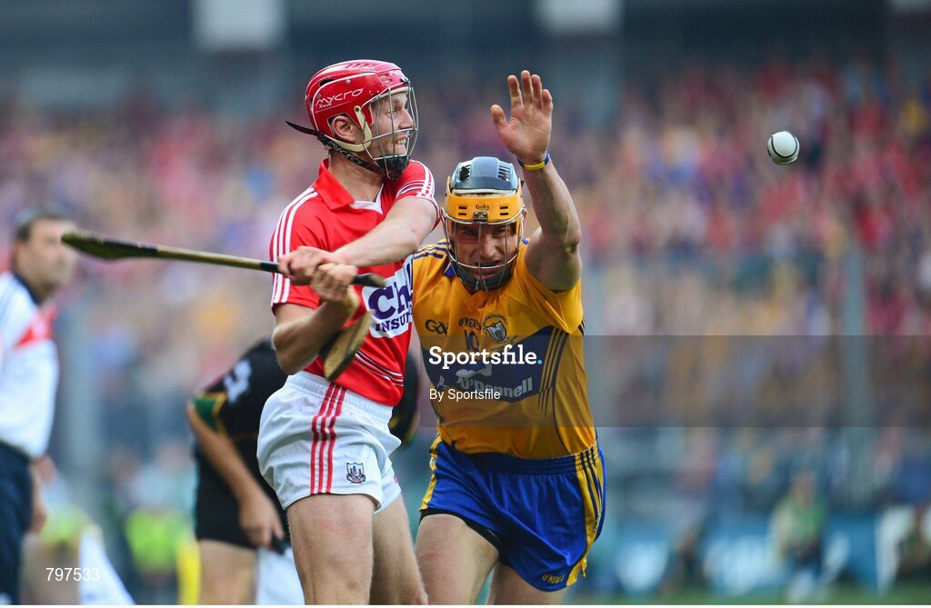 28 September 2013; Lorcan McLoughlin, Cork, in action against John Conlon, Clare. GAA Hurling All-Ireland Senior Championship Final Replay, Cork v Clare, Croke Park, Dublin. Photo by Sportsfile