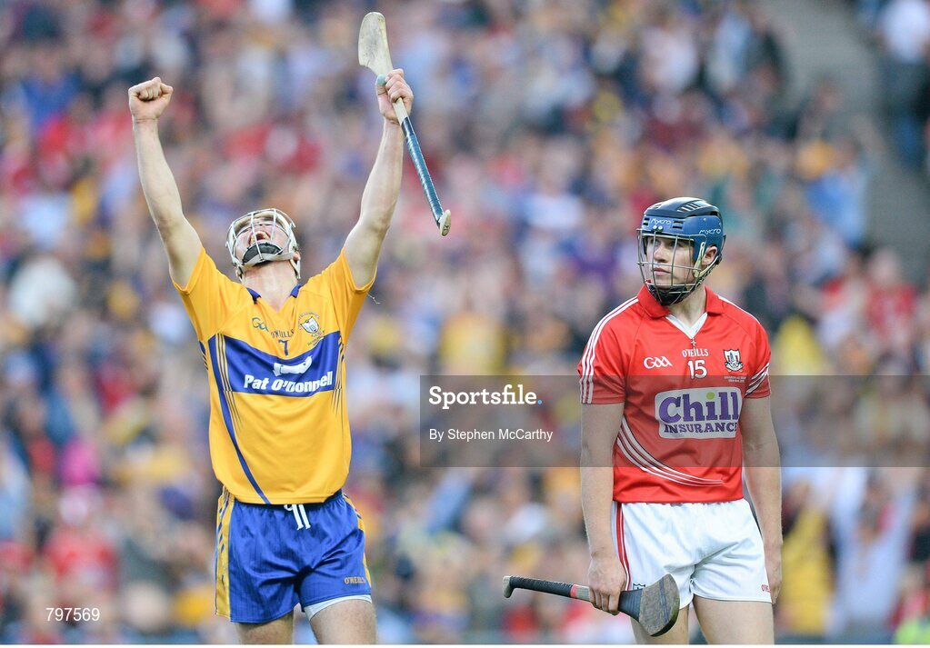28 September 2013; Patrick O'Connor, Clare, celebrates at the final whistle as Cork's Conor Lehane looks on. GAA Hurling All-Ireland Senior Championship Final Replay, Cork v Clare, Croke Park, Dublin. Picture credit: Stephen McCarthy / SPORTSFILE