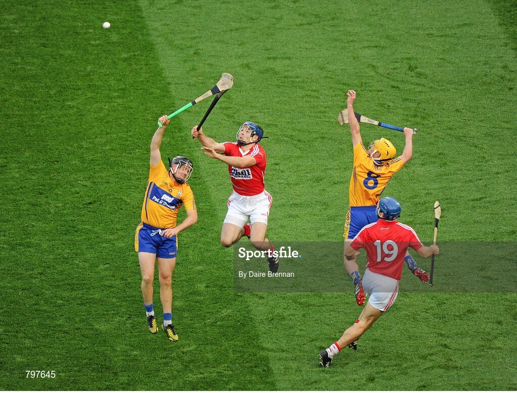 28 September 2013; Colin Ryan, left, and Colm Galvin, Clare, in action against Christopher Joyce, left, and Tom Kenny, Cork. GAA Hurling All-Ireland Senior Championship Final Replay, Cork v Clare, Croke Park, Dublin. Picture credit: Daire Brennan / SPORTSFILE