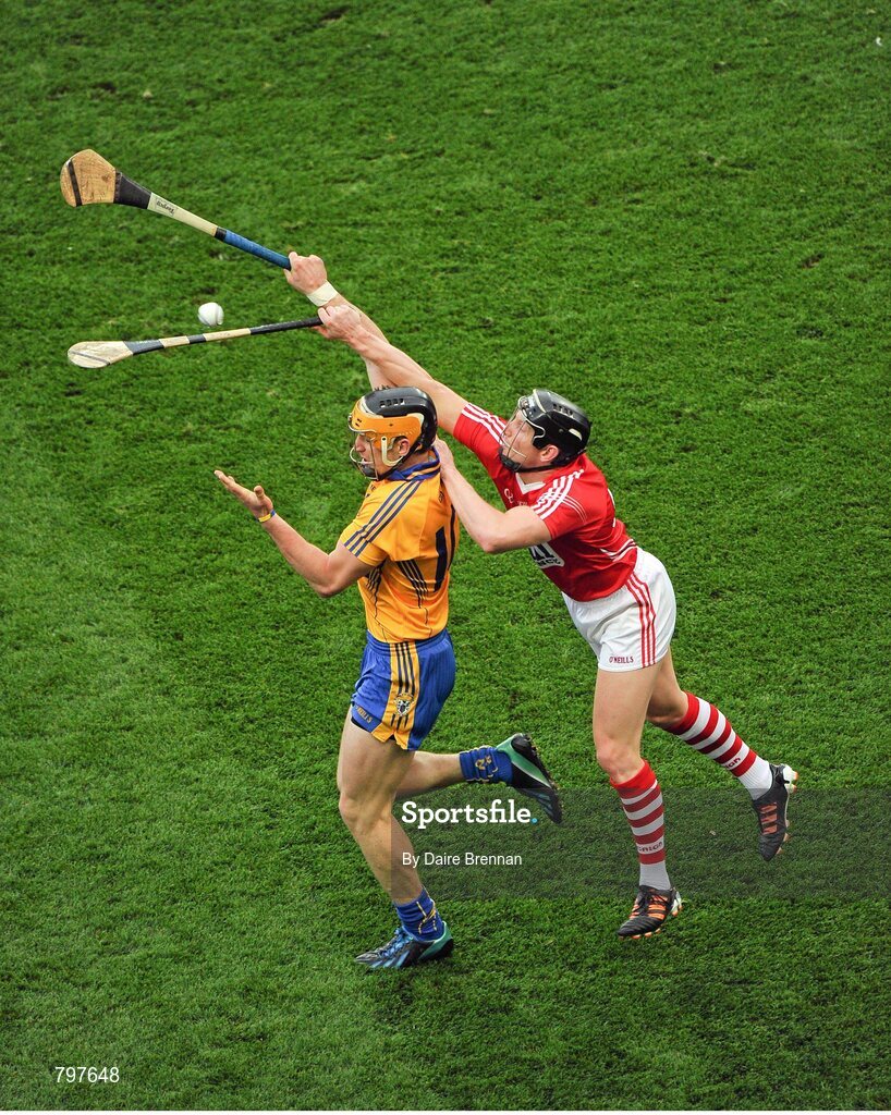 28 September 2013; John Conlon, Clare, in action against Stephen White, Cork. GAA Hurling All-Ireland Senior Championship Final Replay, Cork v Clare, Croke Park, Dublin. Picture credit: Daire Brennan / SPORTSFILE