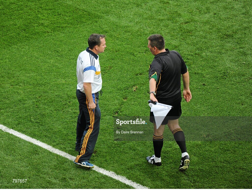 28 September 2013; Linesman Brian Gavin tells Clare manager Davy Fitzgerald to leave the pitch. GAA Hurling All-Ireland Senior Championship Final Replay, Cork v Clare, Croke Park, Dublin. Picture credit: Daire Brennan / SPORTSFILE