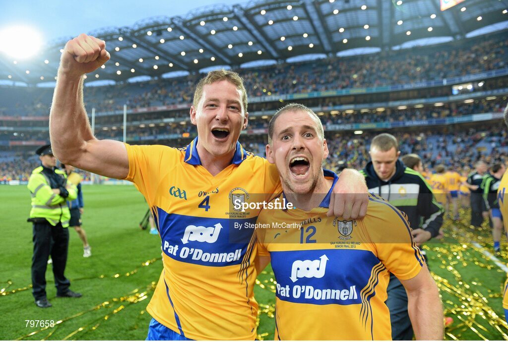 28 September 2013; Clare players Cian Dillon, left and Colin Ryan celebrate with the Liam MacCarthy cup after their side's victory. GAA Hurling All-Ireland Senior Championship Final Replay, Cork v Clare, Croke Park, Dublin. Picture credit: Stephen McCarthy / SPORTSFILE