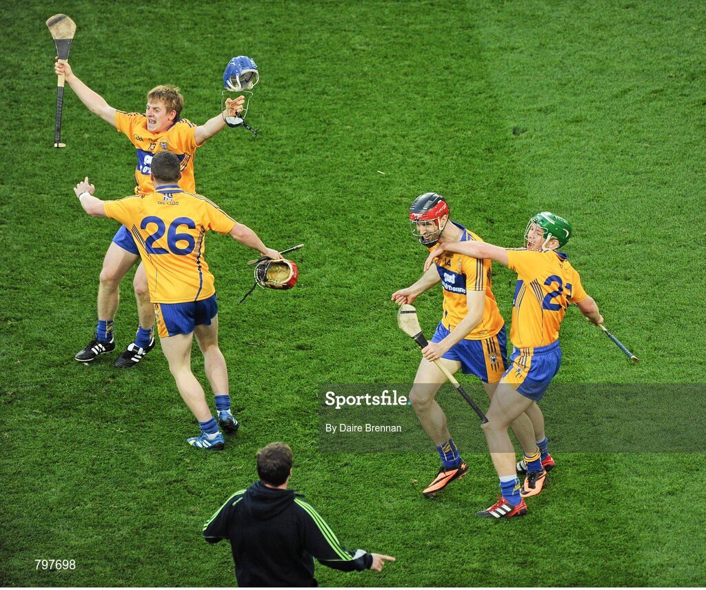 28 September 2013; Clare players, from left, Pádraic Collins, Paul Flanagan, Darach Honan, and Cathal McInerney, celebrate after the game. GAA Hurling All-Ireland Senior Championship Final Replay, Cork v Clare, Croke Park, Dublin. Picture credit: Daire Brennan / SPORTSFILE