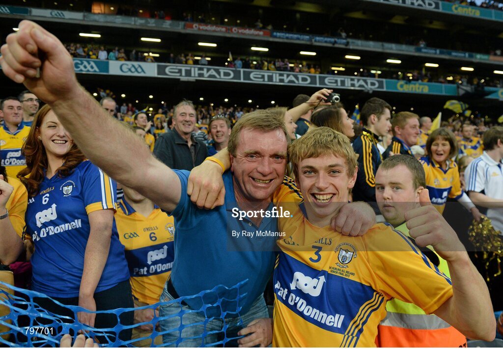 28 September 2013; Clare's David McInerney celebrates with his father after victory over Cork. GAA Hurling All-Ireland Senior Championship Final Replay, Cork v Clare, Croke Park, Dublin. Picture credit: Ray McManus / SPORTSFILE
