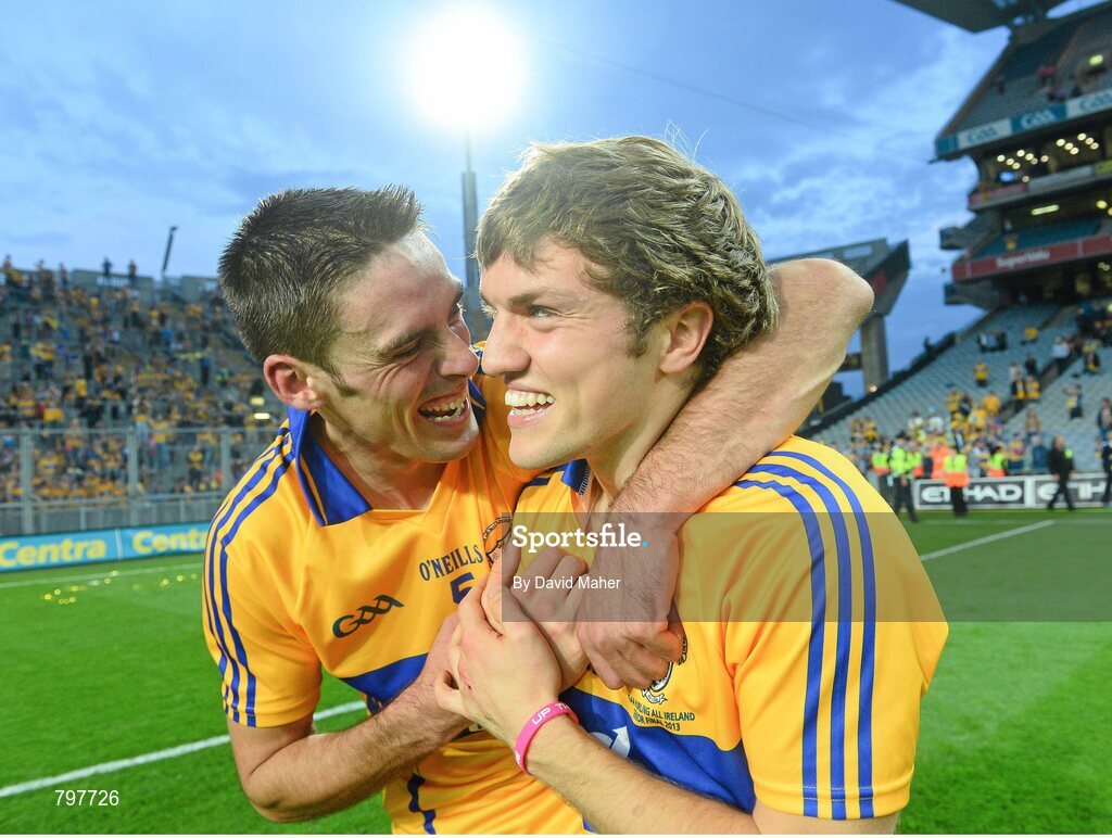 28 September 2013; Shane O'Donnell, Clare, celebrates with Brendan Bugler, left, at the end of the game. GAA Hurling All-Ireland Senior Championship Final Replay, Cork v Clare, Croke Park, Dublin. Picture credit: David Maher / SPORTSFILE