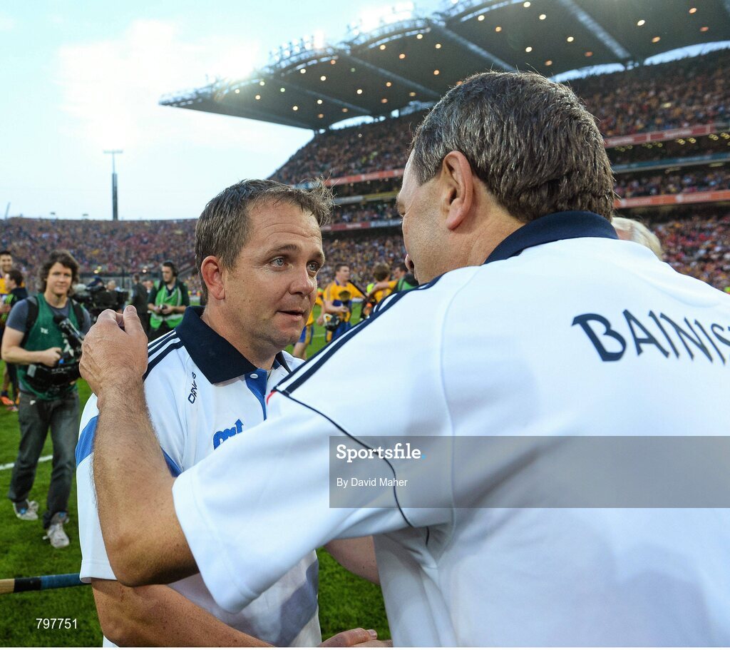 28 September 2013; Clare manager Davy Fitzgerald, left, is congratuladed by Cork manager Jimmy Barry Murphy at the end of the game. GAA Hurling All-Ireland Senior Championship Final Replay, Cork v Clare, Croke Park, Dublin. Picture credit: David Maher / SPORTSFILE