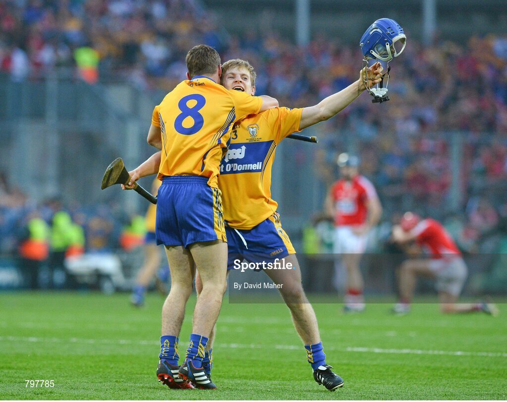 28 September 2013; Padraic Collins, Clare, celebrates with team-mate Colm Galvin, 8, at the end of the game. GAA Hurling All-Ireland Senior Championship Final Replay, Cork v Clare, Croke Park, Dublin. Picture credit: David Maher / SPORTSFILE