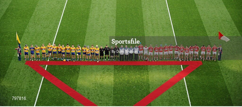 28 September 2013; The two teams along with the match officials await the arrival of the President of Ireland, Michael D. Higgins. GAA Hurling All-Ireland Senior Championship Final Replay, Cork v Clare, Croke Park, Dublin. Picture credit: Daire Brennan / SPORTSFILE