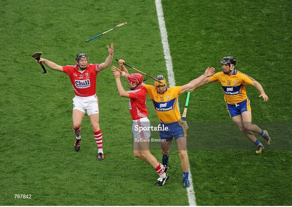 28 September 2013; Lorcán McLoughlin, right, and Stephen White, Cork, in action against John Conlon, left, and Colin Ryan, Clare. GAA Hurling All-Ireland Senior Championship Final Replay, Cork v Clare, Croke Park, Dublin. Picture credit: Daire Brennan / SPORTSFILE