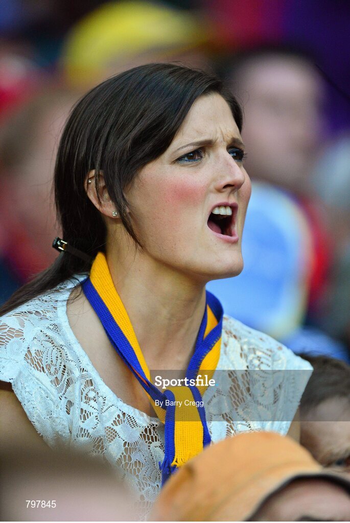 28 September 2013; A Clare supporter cheers on her side during the game. GAA Hurling All-Ireland Senior Championship Final Replay, Cork v Clare, Croke Park, Dublin. Picture credit: Barry Cregg / SPORTSFILE