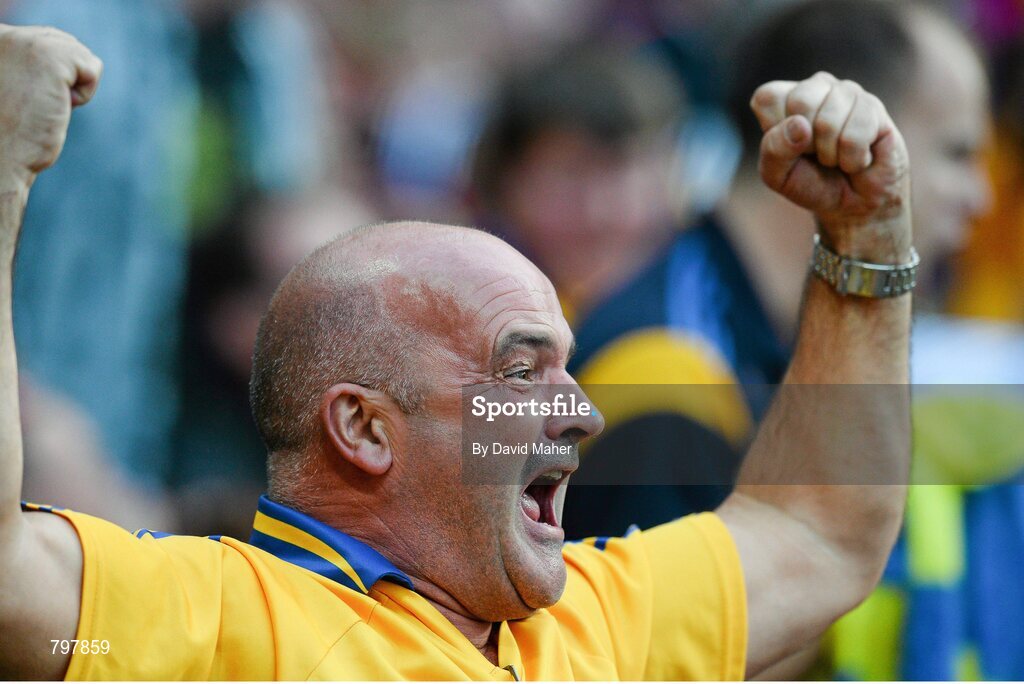 28 September 2013; A Clare supporter cheers on during the game. GAA Hurling All-Ireland Senior Championship Final Replay, Cork v Clare, Croke Park, Dublin. Picture credit: David Maher / SPORTSFILE