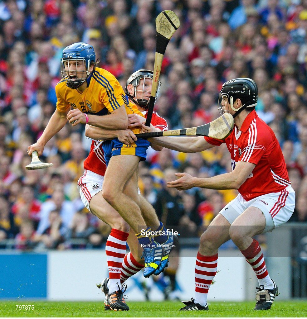 28 September 2013; Nicky O'Connell, Clare, is tackled by Cork players Stephen White, left, and Shane O'Neill. GAA Hurling All-Ireland Senior Championship Final Replay, Cork v Clare, Croke Park, Dublin. Picture credit: Ray McManus / SPORTSFILE