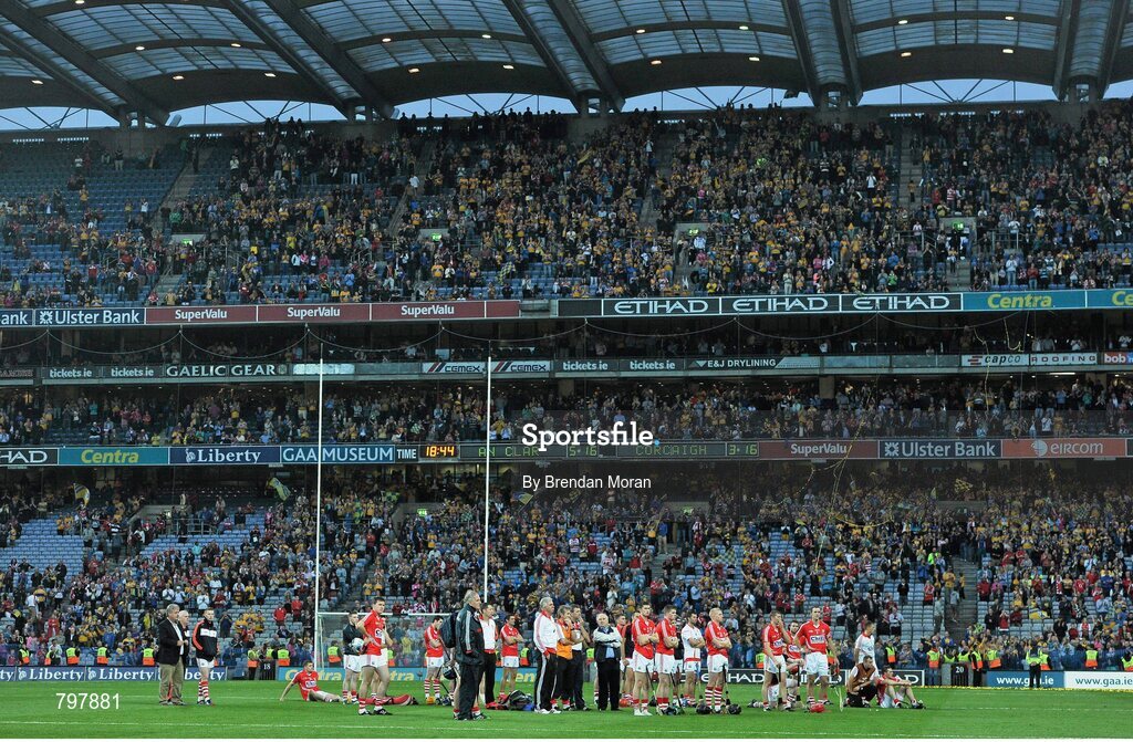 28 September 2013; The Cork team stand dejected as they watch the presentation of the Liam MacCarthy cup to the victorious Clare team. GAA Hurling All-Ireland Senior Championship Final Replay, Cork v Clare, Croke Park, Dublin. Picture credit: Brendan Moran / SPORTSFILE