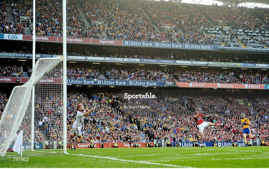 28 September 2013; Conor McGrath, Clare, beats Cork goalkeeper Anthony Nash to score his side's fourth goal. GAA Hurling All-Ireland Senior Championship Final Replay, Cork v Clare, Croke Park, Dublin. Picture credit: David Maher / SPORTSFILE