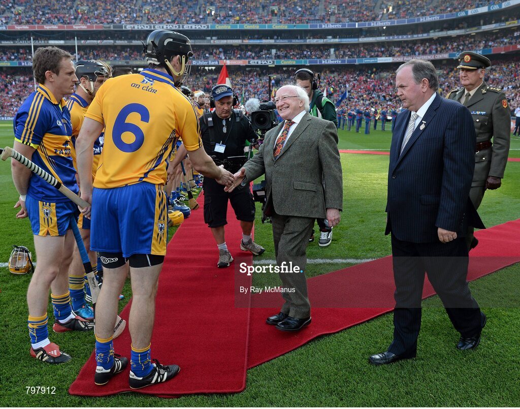 28 September 2013; Clare captain Patrick Donnellan introduces himself, and his team mates, to President of Ireland Michael D. Higgins and Uachtarán Chumann Lúthchleas Gael Liam Ó Néill before the game. GAA Hurling All-Ireland Senior Championship Final Replay, Cork v Clare, Croke Park, Dublin. Picture credit: Ray McManus / SPORTSFILE