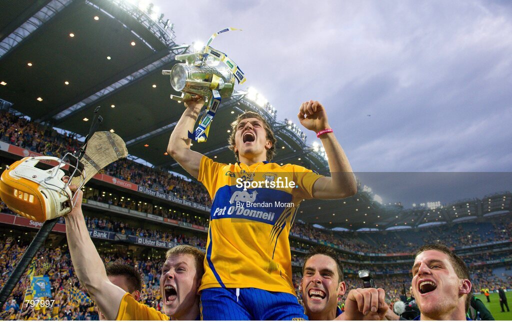 28 September 2013; Clare goalscorer Shane O'Donnell is lifted by his team-mates as they celebrate with the Liam MacCarthy cup after the game. GAA Hurling All-Ireland Senior Championship Final Replay, Cork v Clare, Croke Park, Dublin. Picture credit: Brendan Moran / SPORTSFILE