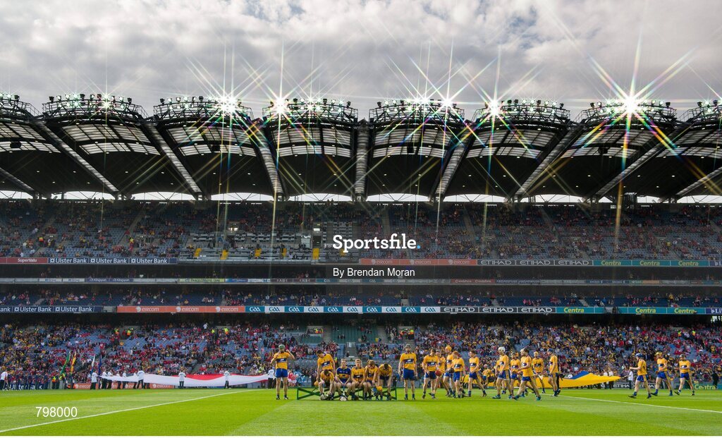 28 September 2013; The Clare team make their way to the team bench for the traditional team photograph before the game. GAA Hurling All-Ireland Senior Championship Final Replay, Cork v Clare, Croke Park, Dublin. Picture credit: Brendan Moran / SPORTSFILE