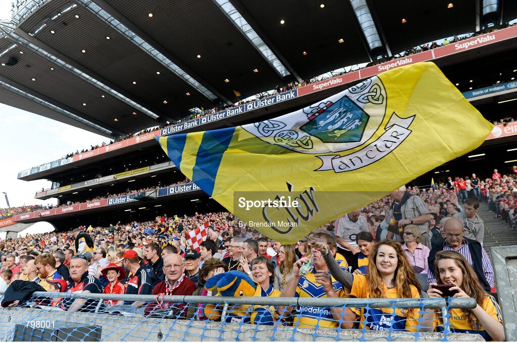 28 September 2013; Clare supporters in the Cusack Stand cheer on their side before the game. GAA Hurling All-Ireland Senior Championship Final Replay, Cork v Clare, Croke Park, Dublin. Picture credit: Brendan Moran / SPORTSFILE