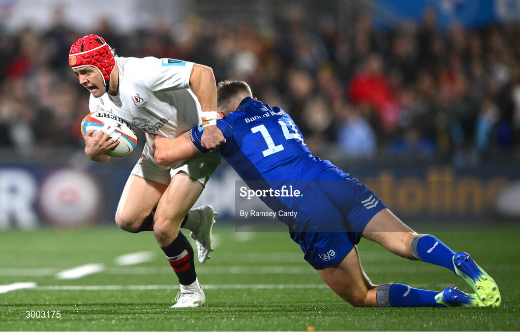 29 November 2024; Michael Lowry of Ulster in action against Jordan Larmour of Leinster during the United Rugby Championship match between Ulster and Leinster at Kingspan Stadium in Belfast. Photo by Ramsey Cardy/Sportsfile