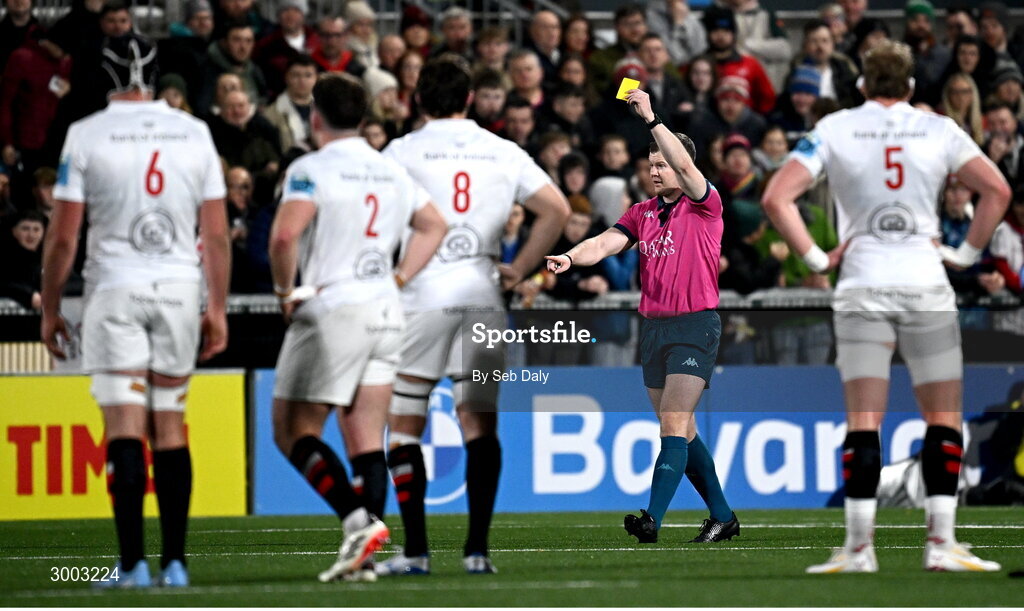 29 November 2024; Referee Eoghan Cross shows a yellow card to Leinster's Brian Deeny, not pictured, during the United Rugby Championship match between Ulster and Leinster at Kingspan Stadium in Belfast. Photo by Seb Daly/Sportsfile