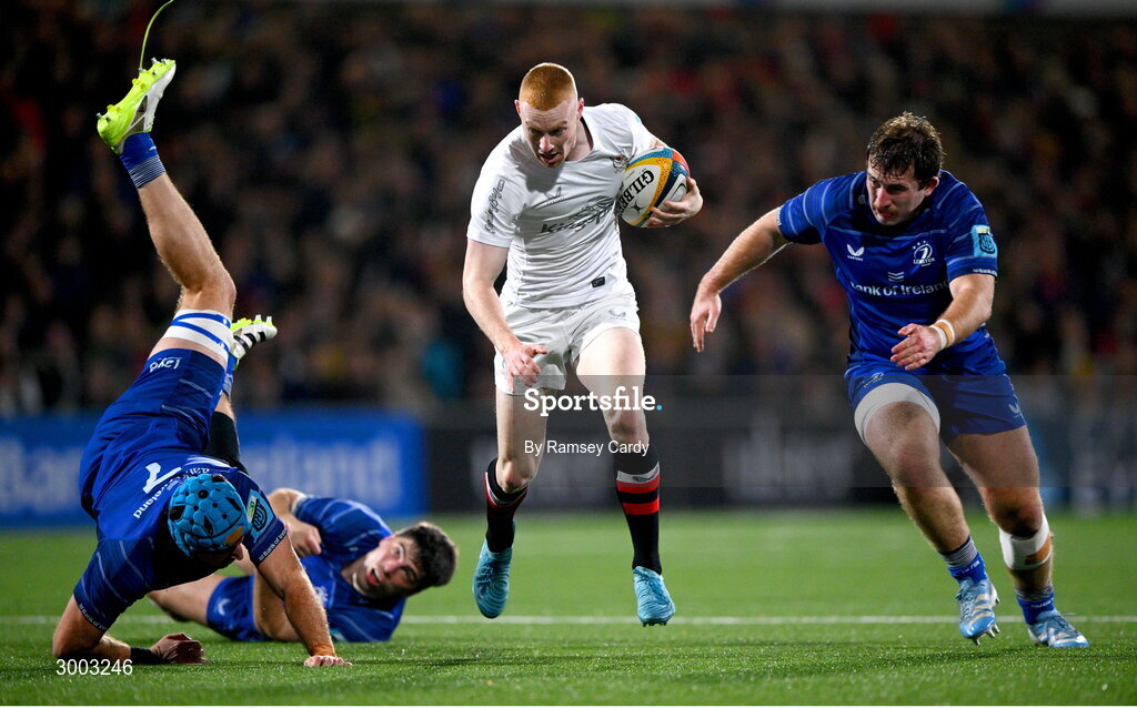 29 November 2024; Nathan Doak of Ulster evades the tackle of Leinster players, from left, Will Connors, Jimmy O'Brien and John McKee during the United Rugby Championship match between Ulster and Leinster at Kingspan Stadium in Belfast. Photo by Ramsey Cardy/Sportsfile