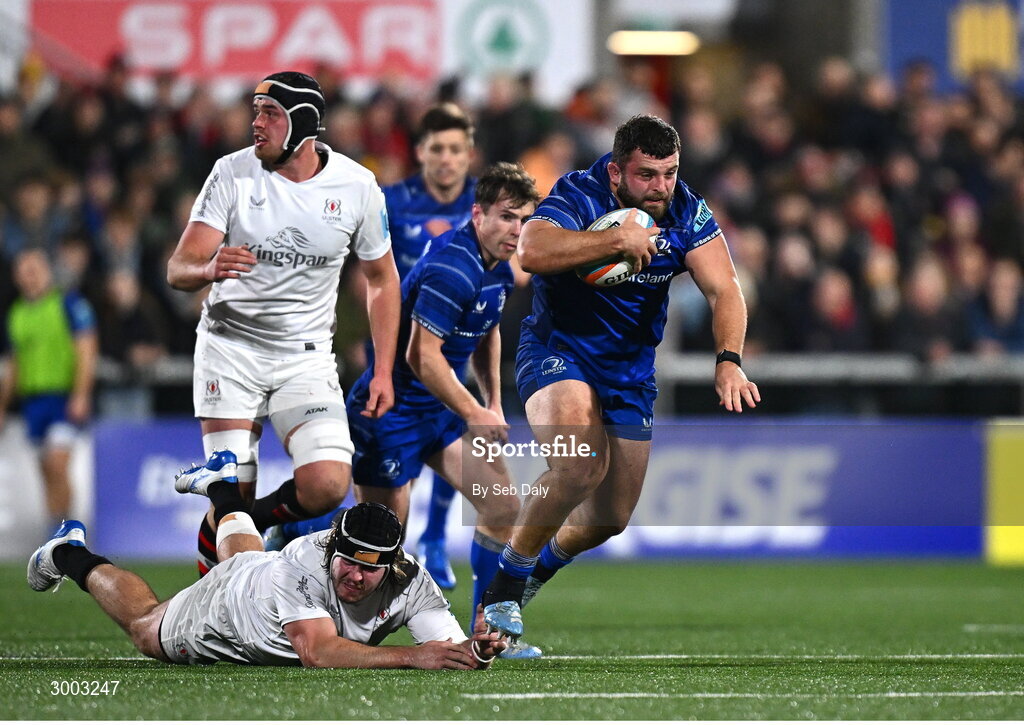 29 November 2024; Michael Milne of Leinster evades the tackle of Ulster's Scott Wilson during the United Rugby Championship match between Ulster and Leinster at Kingspan Stadium in Belfast. Photo by Seb Daly/Sportsfile