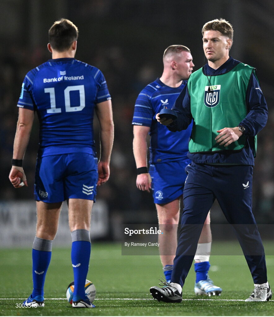 29 November 2024; Jordie Barrett of Leinster hands the kicking tee to Ross Byrne of Leinster during the United Rugby Championship match between Ulster and Leinster at Kingspan Stadium in Belfast. Photo by Ramsey Cardy/Sportsfile