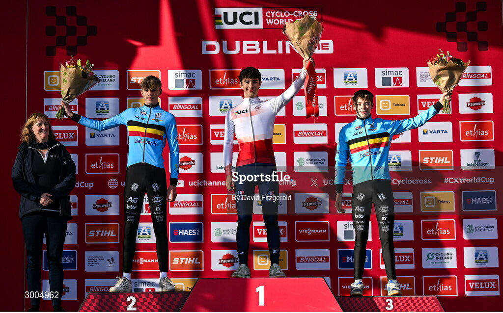 1 December 2024; The Men's U19 podium, race winner Soren Bruyère Joumard of France, centre, second place Giel Lejeune of Belgium, left, and third place Lennes Jacobs of Belgium, with Sport Ireland chief executive officer Dr Úna May at the UCI Cyclo-cross World Cup on the Sport Ireland Campus in Dublin. Photo by David Fitzgerald/Sportsfile