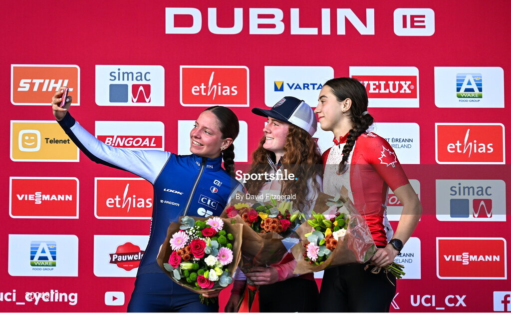 1 December 2024; On the podium after the women's U19 race, race winner Lidia Cusack of USA, centre, second place Lison Desprez of France, left, and third place Rafaelle Carrier of Canada, at the UCI Cyclo-cross World Cup on the Sport Ireland Campus in Dublin. Photo by David Fitzgerald/Sportsfile