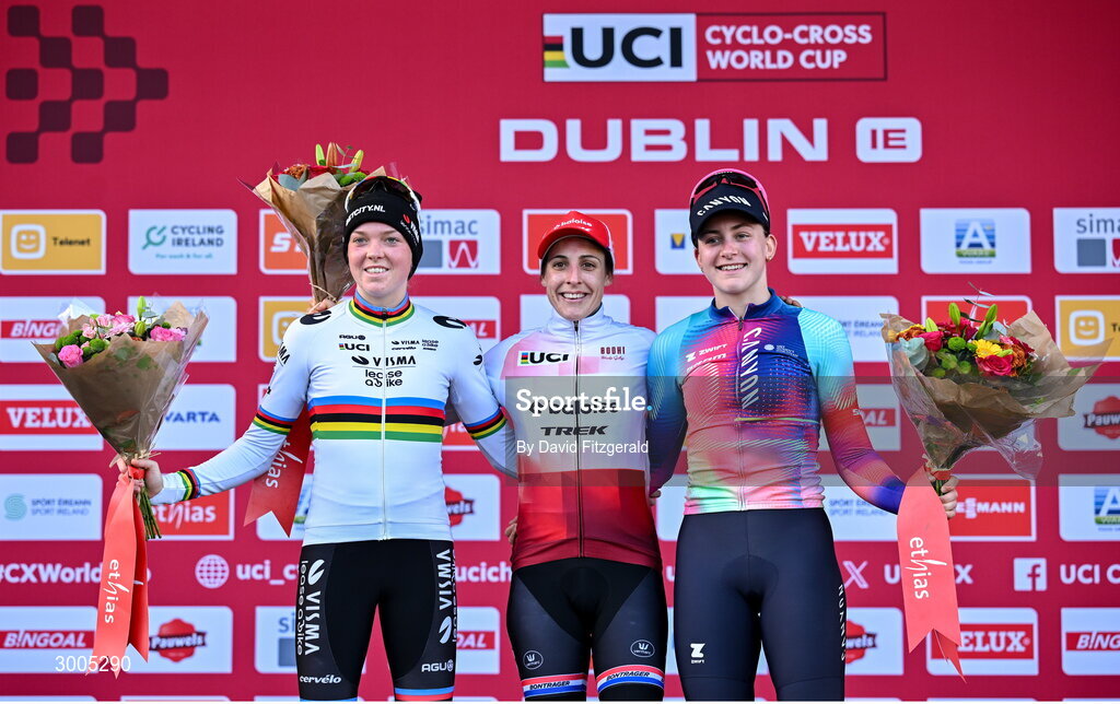 1 December 2024; On the podium after the Women's Elite race are, race winner Lucinda Brown of Netherlands, centre, second place Fem van Empel of Netherlands, left, and third place Zoe Backstedt of Great Britain, at the UCI Cyclo-cross World Cup on the Sport Ireland Campus in Dublin. Photo by David Fitzgerald/Sportsfile