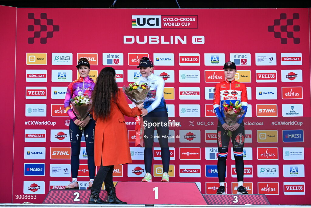 1 December 2024; On the podium after the Women's Elite race are the Under 23 riders, first place Zoe Backstedt, centre, second place Marie Schreiber, left, and third place Leonie Bentveld at the UCI Cyclo-cross World Cup on the Sport Ireland Campus in Dublin. Photo by David Fitzgerald/Sportsfile  Photo by David Fitzgerald/Sportsfile