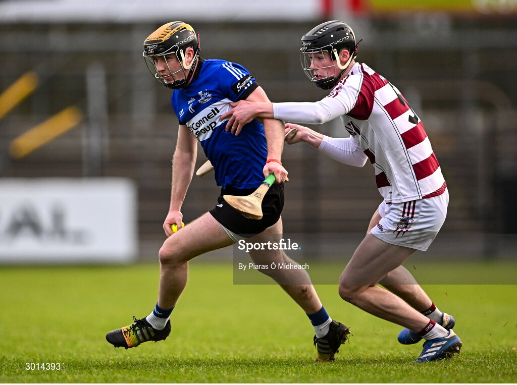 15 December 2024; Daniel Hogan of Sarsfields in action against Mark McGuigan of Slaughtneil during the AIB GAA Hurling All-Ireland Senior Club Championship semi-final match between Sarsfields of Cork and Slaughtneil of Derry at Cedral St Conleth's Park in Newbridge, Kildare. Photo by Piaras Ó Mídheach/Sportsfile
