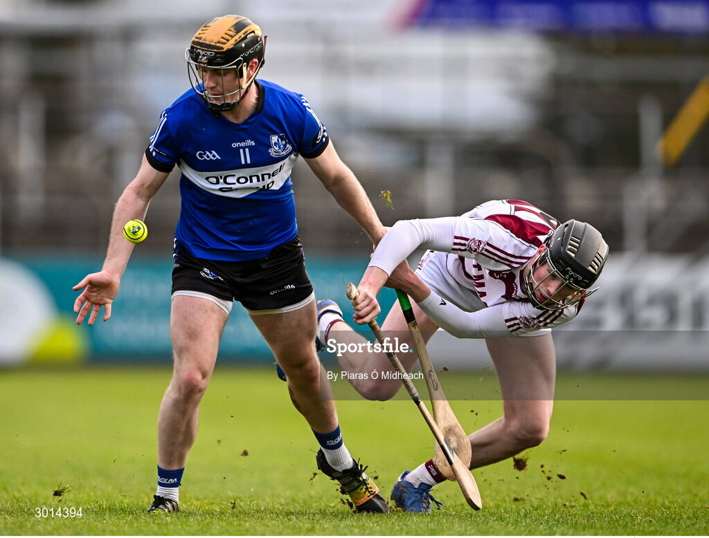 15 December 2024; Daniel Hogan of Sarsfields in action against Mark McGuigan of Slaughtneil during the AIB GAA Hurling All-Ireland Senior Club Championship semi-final match between Sarsfields of Cork and Slaughtneil of Derry at Cedral St Conleth's Park in Newbridge, Kildare. Photo by Piaras Ó Mídheach/Sportsfile
