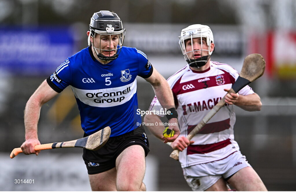 15 December 2024; Bryan Murphy of Sarsfields gets away from Conor McAllister of Slaughtneil during the AIB GAA Hurling All-Ireland Senior Club Championship semi-final match between Sarsfields of Cork and Slaughtneil of Derry at Cedral St Conleth's Park in Newbridge, Kildare. Photo by Piaras Ó Mídheach/Sportsfile