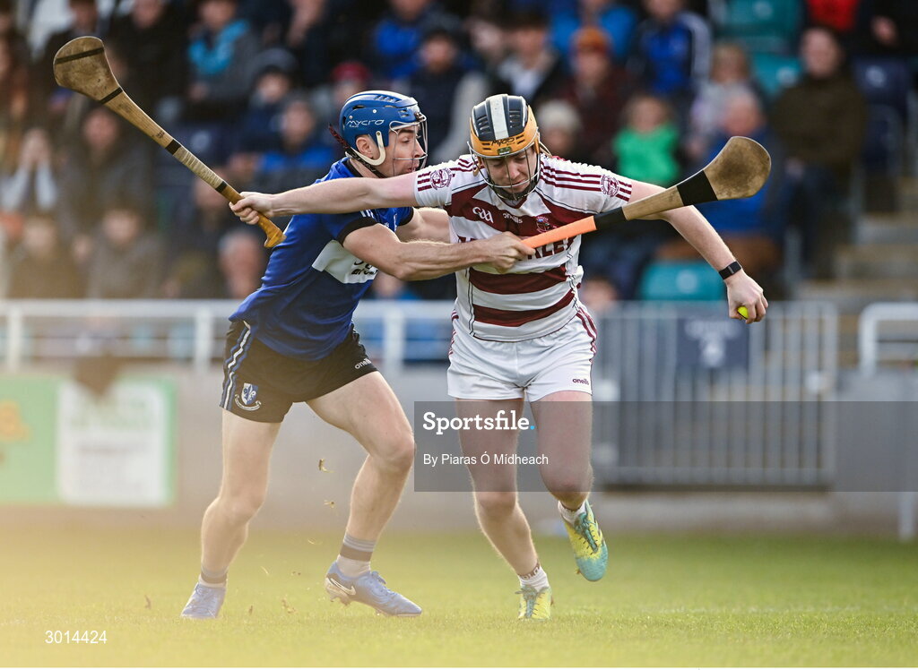 15 December 2024; Shéa Cassidy of Slaughtneil in action against Conor O'Sullivan of Sarsfields during the AIB GAA Hurling All-Ireland Senior Club Championship semi-final match between Sarsfields of Cork and Slaughtneil of Derry at Cedral St Conleth's Park in Newbridge, Kildare. Photo by Piaras Ó Mídheach/Sportsfile