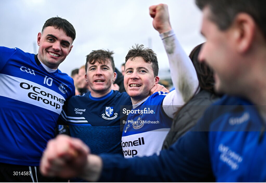 15 December 2024; Sarsfields players, from left, James Sweeney, William Kearney and Daniel Kearney celebrate after their side's victory in the AIB GAA Hurling All-Ireland Senior Club Championship semi-final match between Sarsfields of Cork and Slaughtneil of Derry at Cedral St Conleth's Park in Newbridge, Kildare. Photo by Piaras Ó Mídheach/Sportsfile