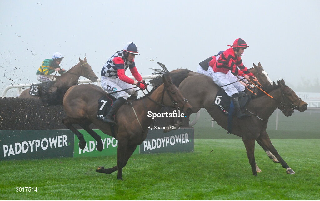 26 December 2024; The eventual winner An Peann Dearg, with Sean O'Keeffe up, hidden on the rails, trails The Folkes Tiara, 6, with Ethan Michael O'Sullivan up, and The King Of Prs, with, Keith Donoghue up, left, on their way to win The Racing Post Handicap Steeplechase race on day one of the Leopardstown Christmas Festival at Leopardstown Racecourse in Dublin. Photo by Shauna Clinton/Sportsfile