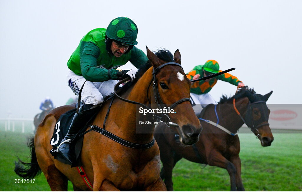 26 December 2024; Green Splendour, with Patrick Mullins up, left, races past Khmer, with Robert James, up, on the way to winning The Race And Stay Flat Race on day one of the Leopardstown Christmas Festival at Leopardstown Racecourse in Dublin. Photo by Shauna Clinton/Sportsfile