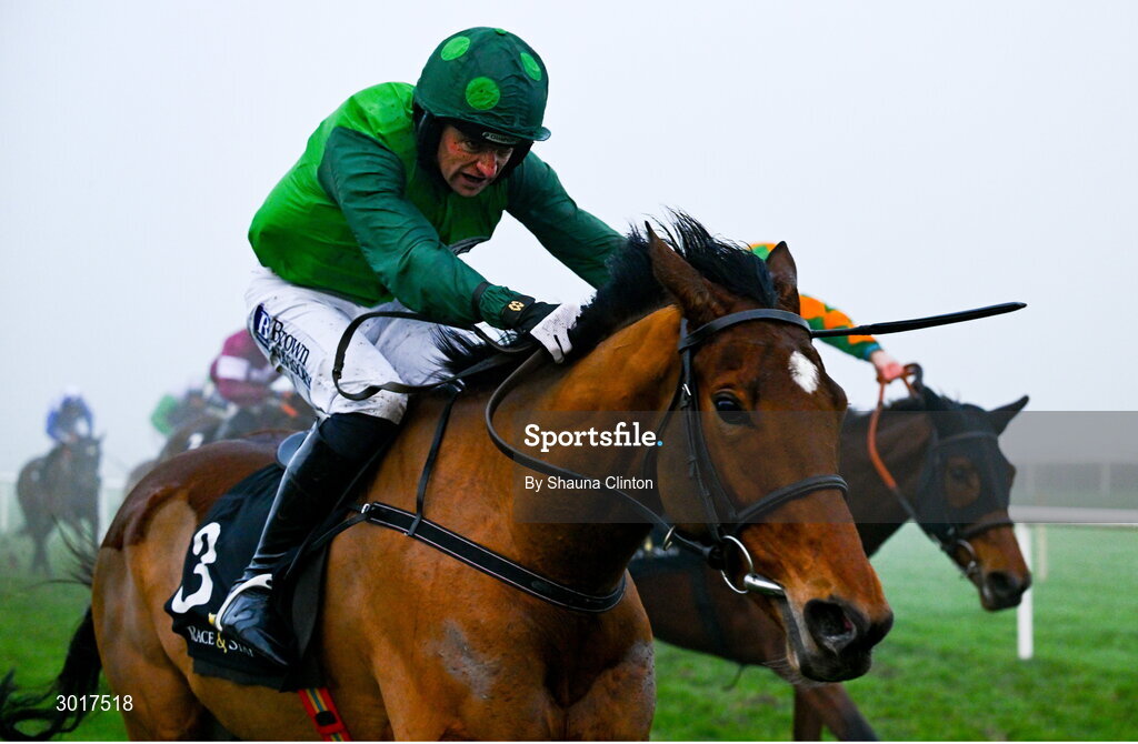 26 December 2024; Green Splendour, with Patrick Mullins up, left, races past Khmer, with Robert James, up, on the way to winning The Race And Stay Flat Race on day one of the Leopardstown Christmas Festival at Leopardstown Racecourse in Dublin. Photo by Shauna Clinton/Sportsfile