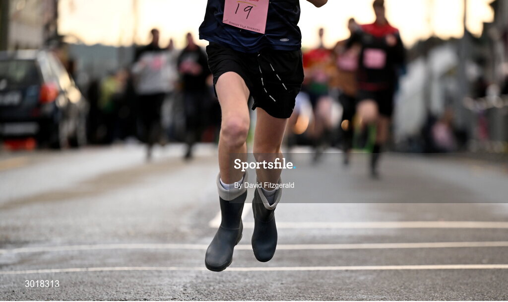 1 January 2025; A participant during the 45th annual Castlecomer Wellie Race in Castlecomer, Kilkenny, ran in aid of a number of local and national charities. Originally started in 1978, the local men decided to run off the Christmas excess by having a race over a cross country circuit. Not being the type of men that would be seen in a pair of proper running shoes, let alone actually own a pair, the most obvious footwear for this type of event was wellingtons. The event also includes a parade and family entertainment throughout the day in Castlecomer. Photo by David Fitzgerald/Sportsfile