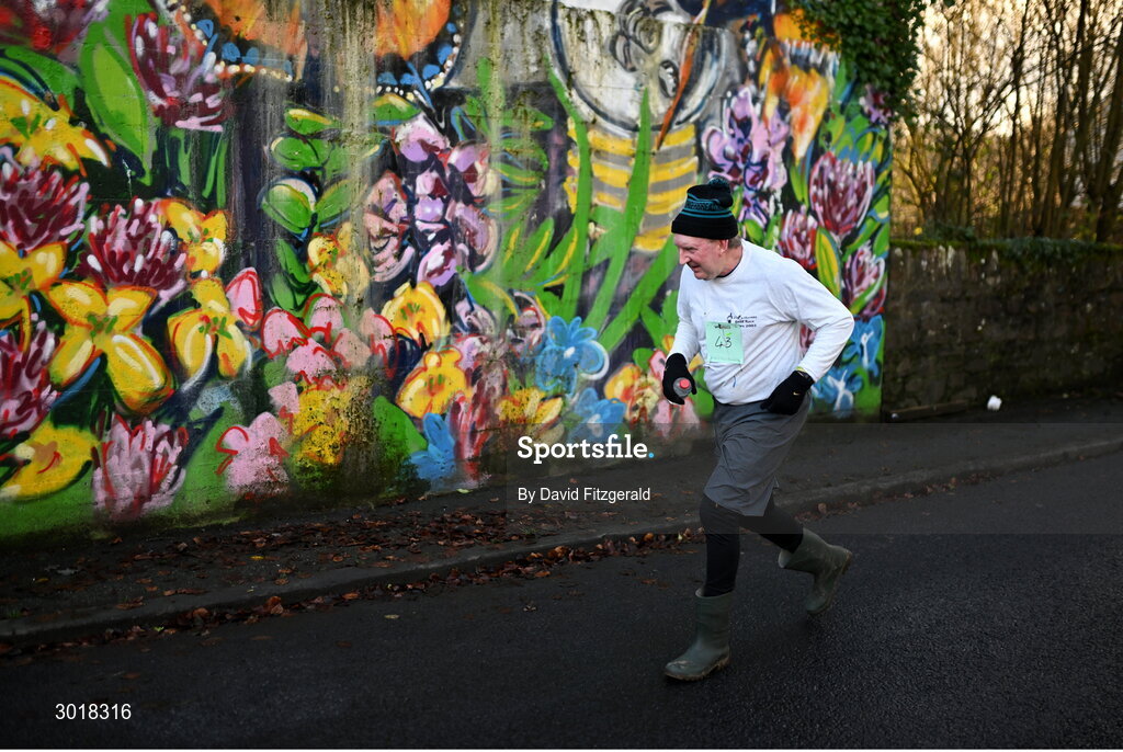 1 January 2025; A participant during the 45th annual Castlecomer Wellie Race in Castlecomer, Kilkenny, ran in aid of a number of local and national charities. Originally started in 1978, the local men decided to run off the Christmas excess by having a race over a cross country circuit. Not being the type of men that would be seen in a pair of proper running shoes, let alone actually own a pair, the most obvious footwear for this type of event was wellingtons. The event also includes a parade and family entertainment throughout the day in Castlecomer. Photo by David Fitzgerald/Sportsfile