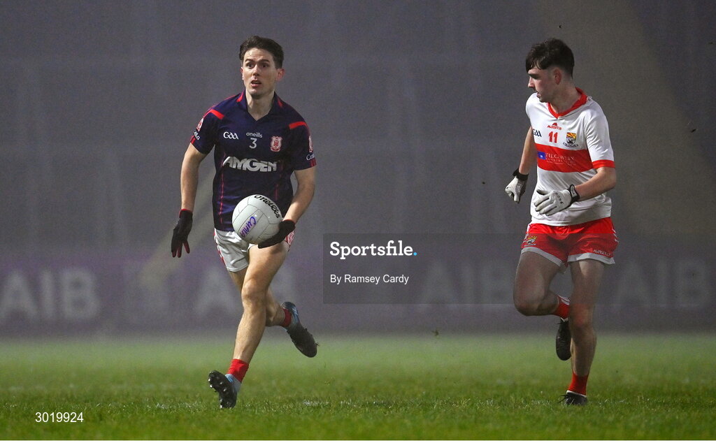 11 January 2025; Michael Fitzsimons of Cuala in action against Mark McDaniel of Coolera-Strandhill during the AIB GAA Football All-Ireland Senior Club Championship semi-final match between Coolera-Strandhill and Cuala at Kingspan Breffni Park in Cavan. Photo by Ramsey Cardy/Sportsfile