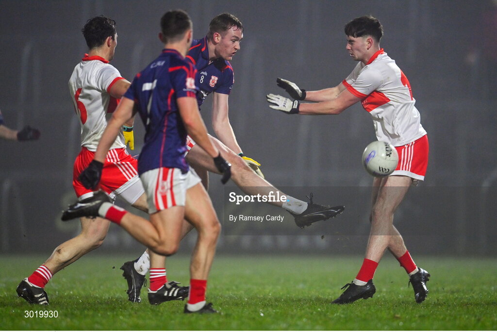 11 January 2025; Peadar Ó Cofaigh Byrne of Cuala shoots under pressure from Mark McDaniel of Coolera-Strandhill during the AIB GAA Football All-Ireland Senior Club Championship semi-final match between Coolera-Strandhill and Cuala at Kingspan Breffni Park in Cavan. Photo by Ramsey Cardy/Sportsfile