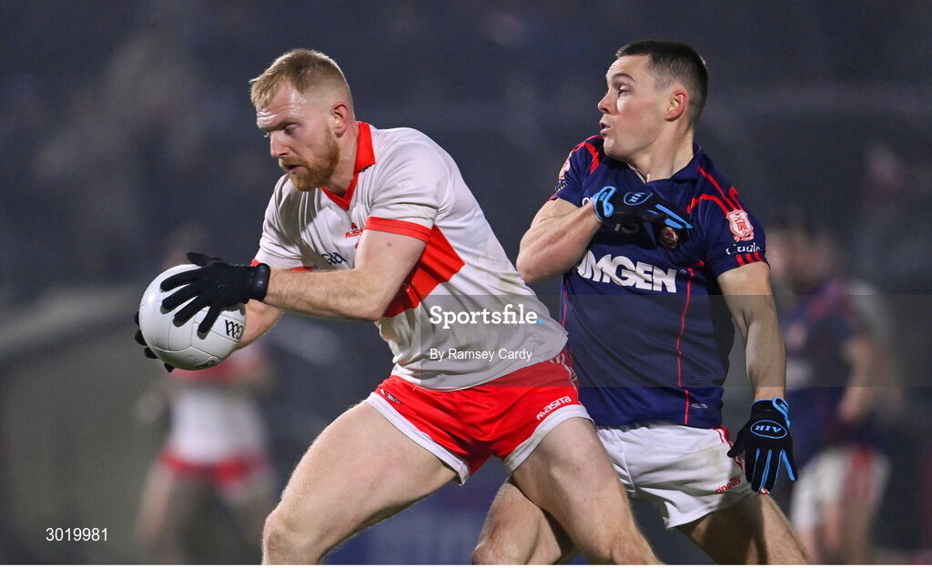 11 January 2025; Sean Taylor of Coolera-Strandhill in action against Con O'Callaghan of Cuala during the AIB GAA Football All-Ireland Senior Club Championship semi-final match between Coolera-Strandhill and Cuala at Kingspan Breffni Park in Cavan. Photo by Ramsey Cardy/Sportsfile