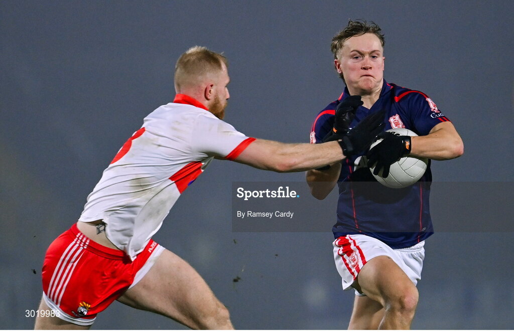 11 January 2025; Eoghan O'Callaghan of Cuala in action against Sean Taylor of Coolera-Strandhill during the AIB GAA Football All-Ireland Senior Club Championship semi-final match between Coolera-Strandhill and Cuala at Kingspan Breffni Park in Cavan. Photo by Ramsey Cardy/Sportsfile