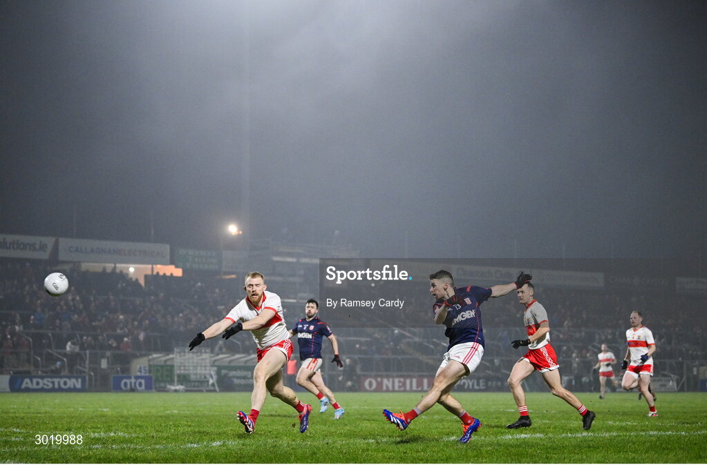 11 January 2025; Luke Keating of Cuala shoots at goal under pressure from Sean Taylor of Coolera-Strandhill during the AIB GAA Football All-Ireland Senior Club Championship semi-final match between Coolera-Strandhill and Cuala at Kingspan Breffni Park in Cavan. Photo by Ramsey Cardy/Sportsfile