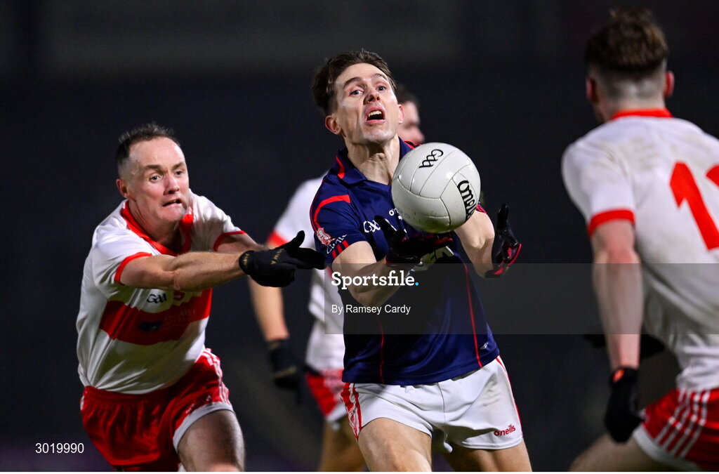 11 January 2025; Michael Fitzsimons of Cuala in action against Jonathan Cassidy of Coolera-Strandhill during the AIB GAA Football All-Ireland Senior Club Championship semi-final match between Coolera-Strandhill and Cuala at Kingspan Breffni Park in Cavan. Photo by Ramsey Cardy/Sportsfile