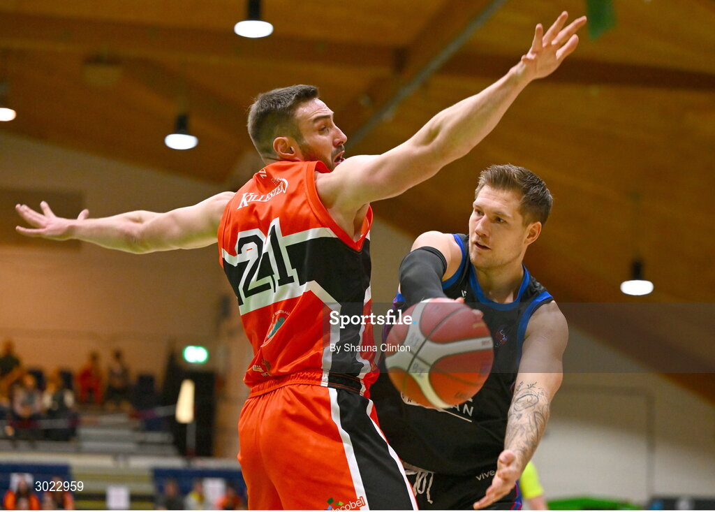 18 January 2025; Tobias Christensen of UCC Demons in action against Baptiste Chazelas of Killester during the Basketball Ireland Men's Pat Duffy National Cup final match between Killester and UCC Demons at the National Basketball Arena in Tallaght, Dublin. Photo by Shauna Clinton/Sportsfile