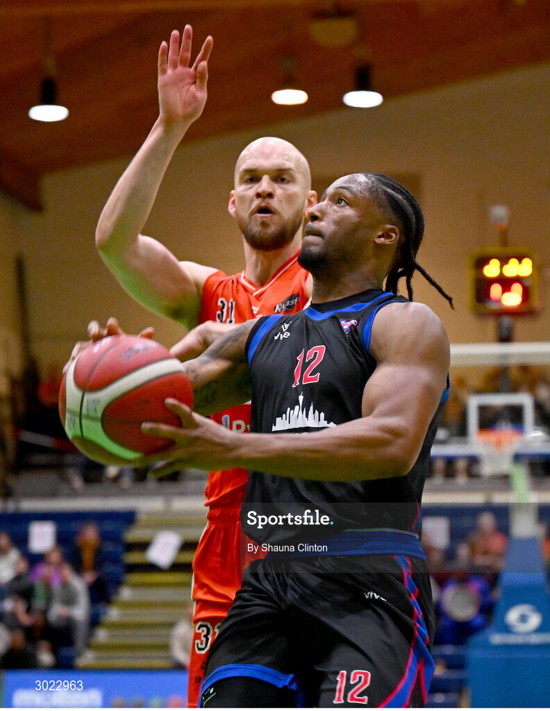 18 January 2025; Patrick Robinson of UCC Demons in action against Paul Dick of Killester during the Basketball Ireland Men's Pat Duffy National Cup final match between Killester and UCC Demons at the National Basketball Arena in Tallaght, Dublin. Photo by Shauna Clinton/Sportsfile